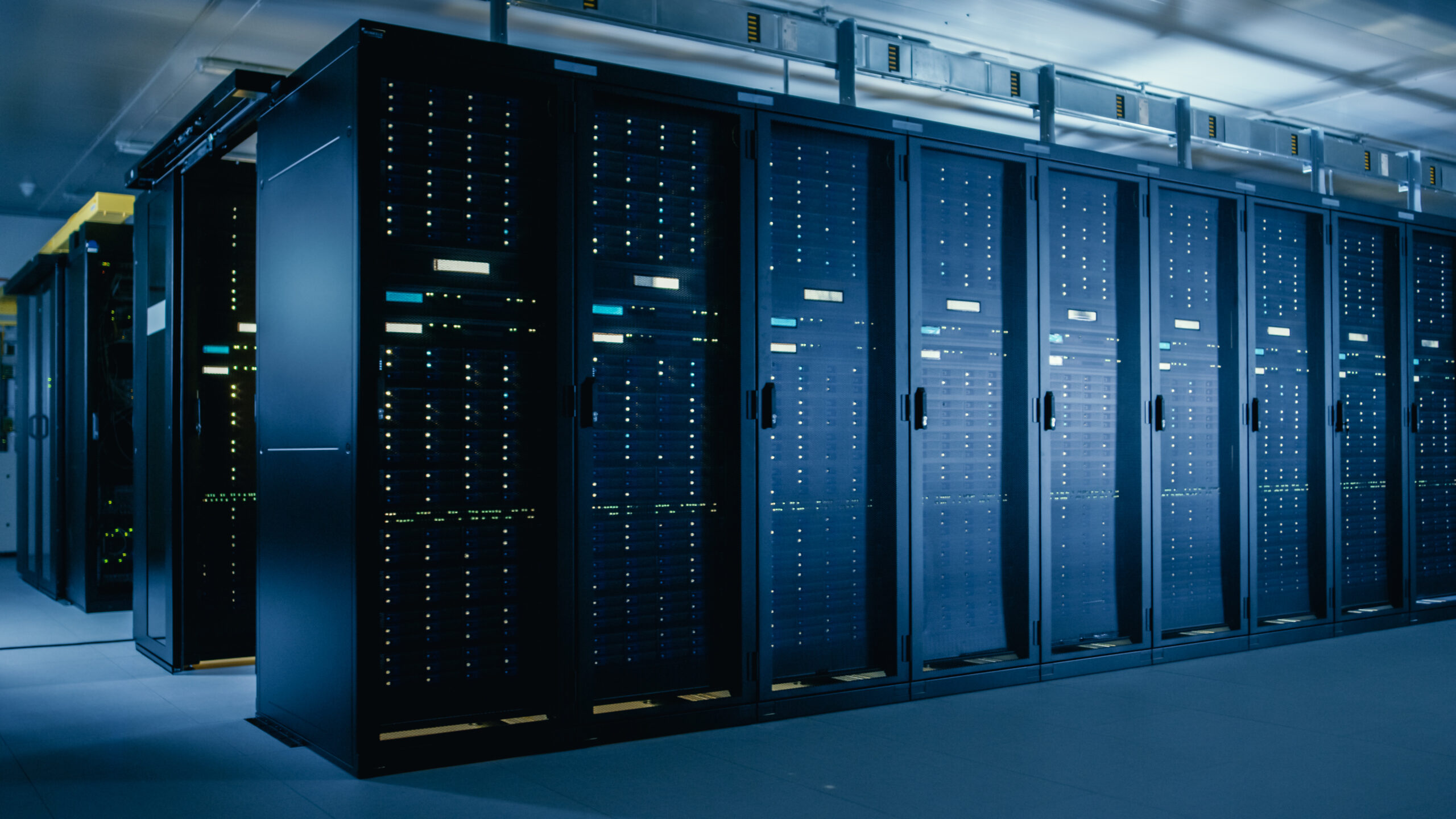 Shot of Data Center With Multiple Rows of Fully Operational Serv AdobeStock 267083342 scaled SAP ILM | Auritas